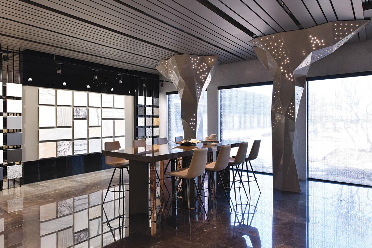 Sculptural columns in marble and single slab KalingaStone quartz top discussion table