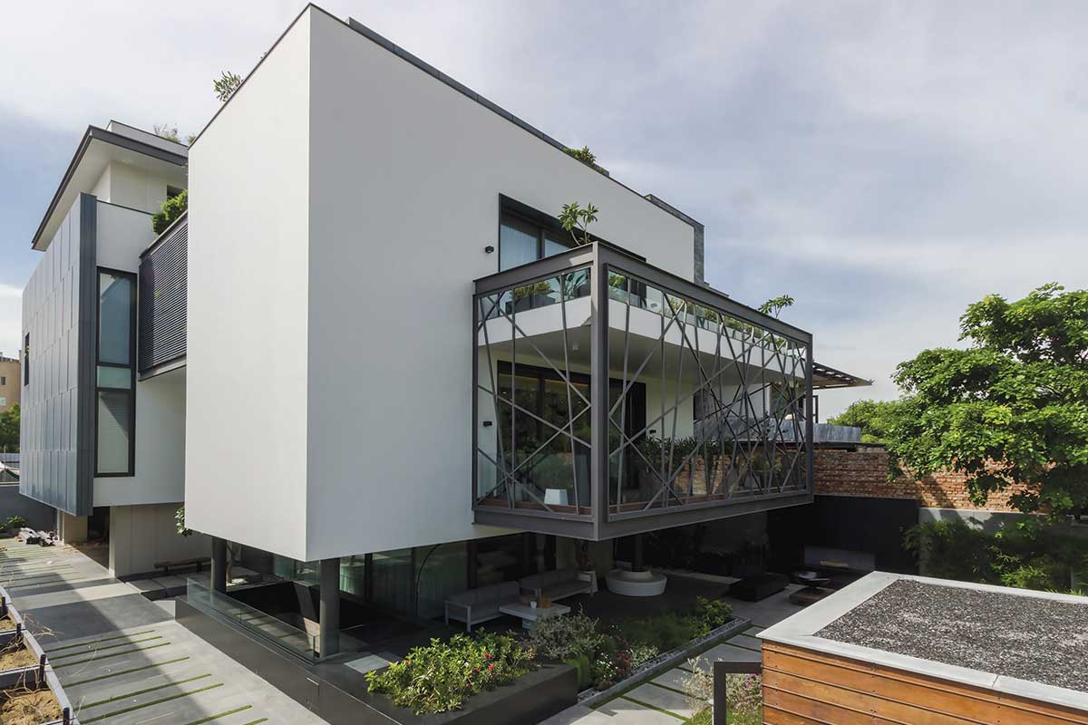 house with robust attributes and voluminous light-filled living spaces