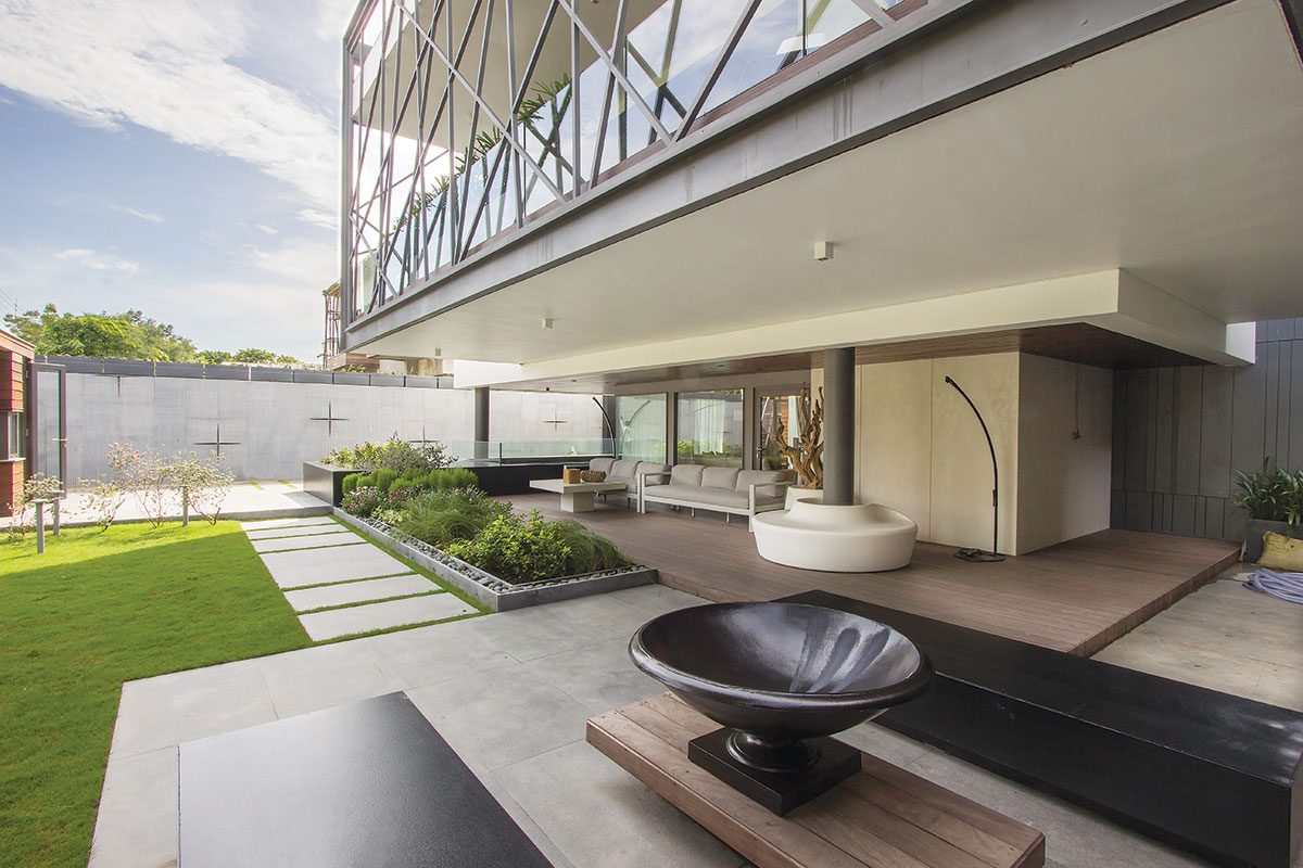 house with robust attributes and voluminous light-filled living spaces
