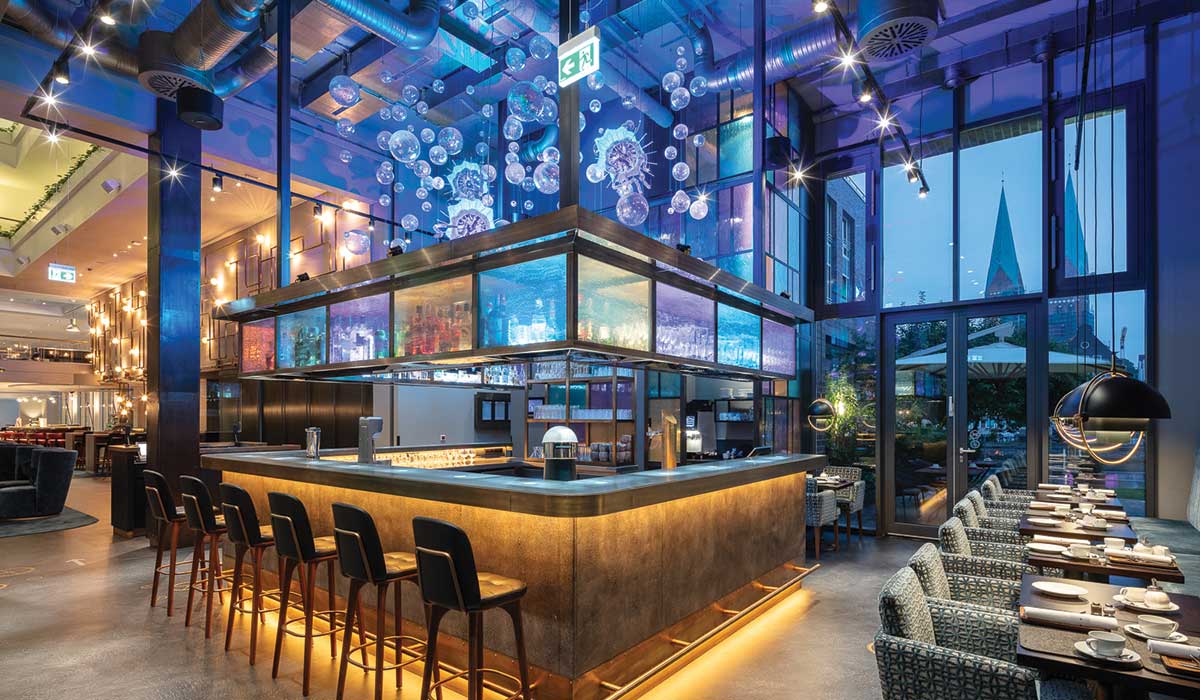 Czech lighting giant Sans Souci has illuminated Nautilo Restaurant in Lübeck, Germany, with a dynamic lighting installation