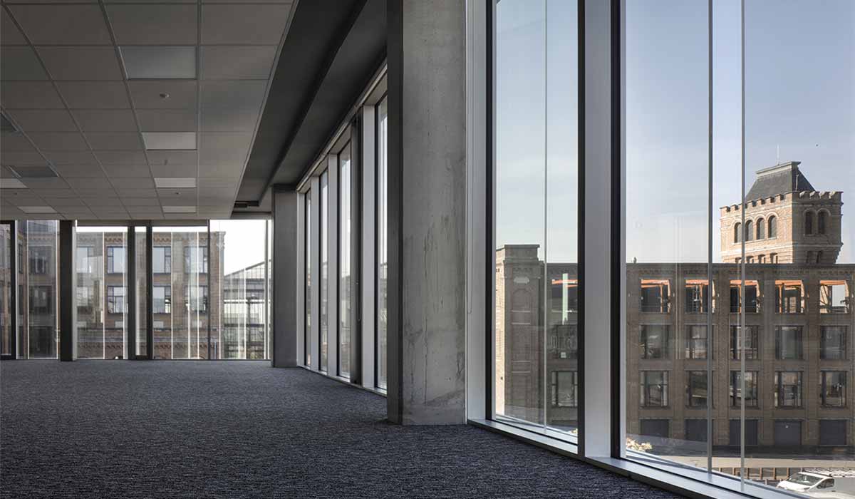 Barbarito Bancel Architectes create a vertical glass louver facade