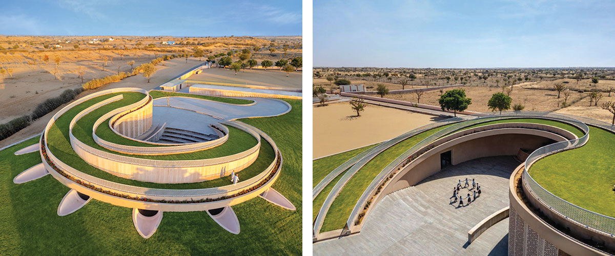 the structure’s sweeping curvilinear volume rises up