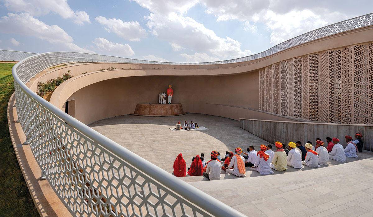 the structure’s sweeping curvilinear volume rises up